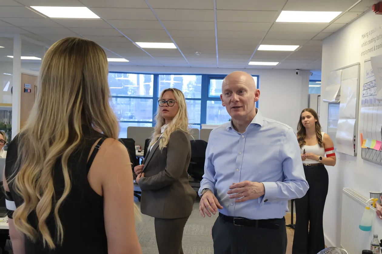 Nick Horton coaching a delegate one to one during a training session